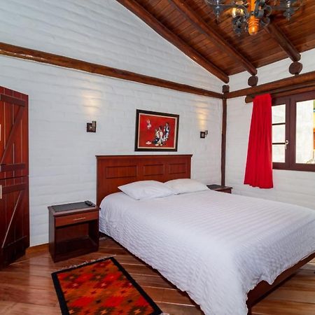 Hostal ILÉ Baños Esterno foto