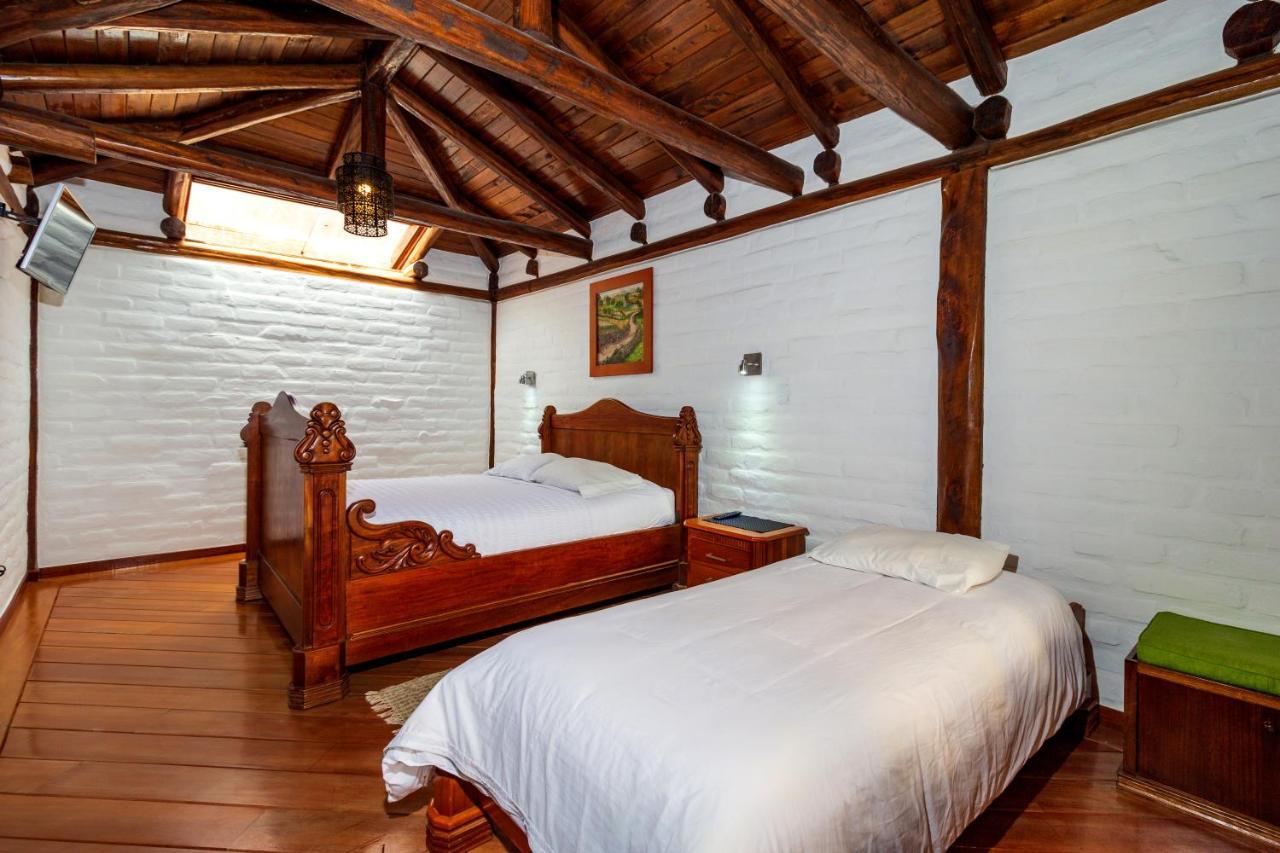 Hostal ILÉ Baños Esterno foto