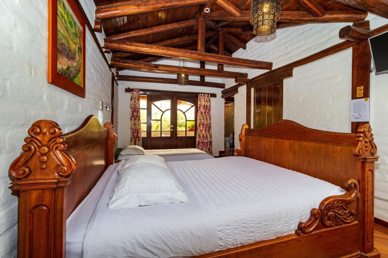 Hostal ILÉ Baños Esterno foto